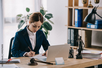 A Young woman lawyer working at her desk